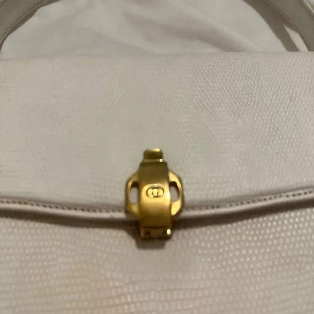 Gucci lizard embossed leather top handle tote